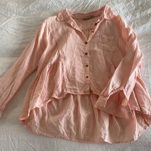 Beautiful asymmetrical button up linen blouse.